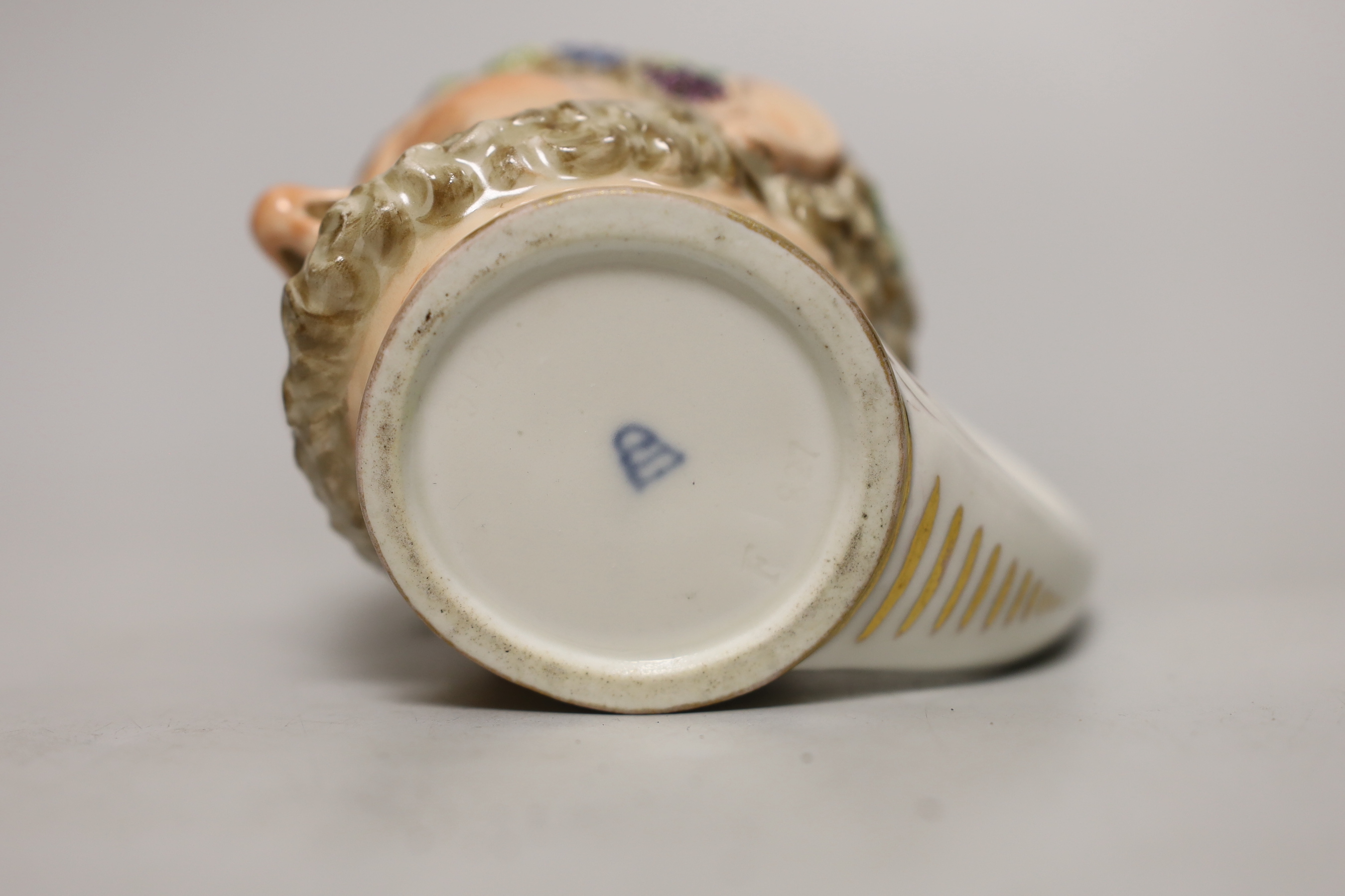 A Vienna porcelain satyr cup, impressed number 827, possibly for the date 1827, 10cm high